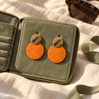 Boucles d'oreilles Guatapé tressées en palmier Iraca orange clair