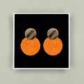 Boucles d'oreilles Guatapé tressées en palmier Iraca orange clair
