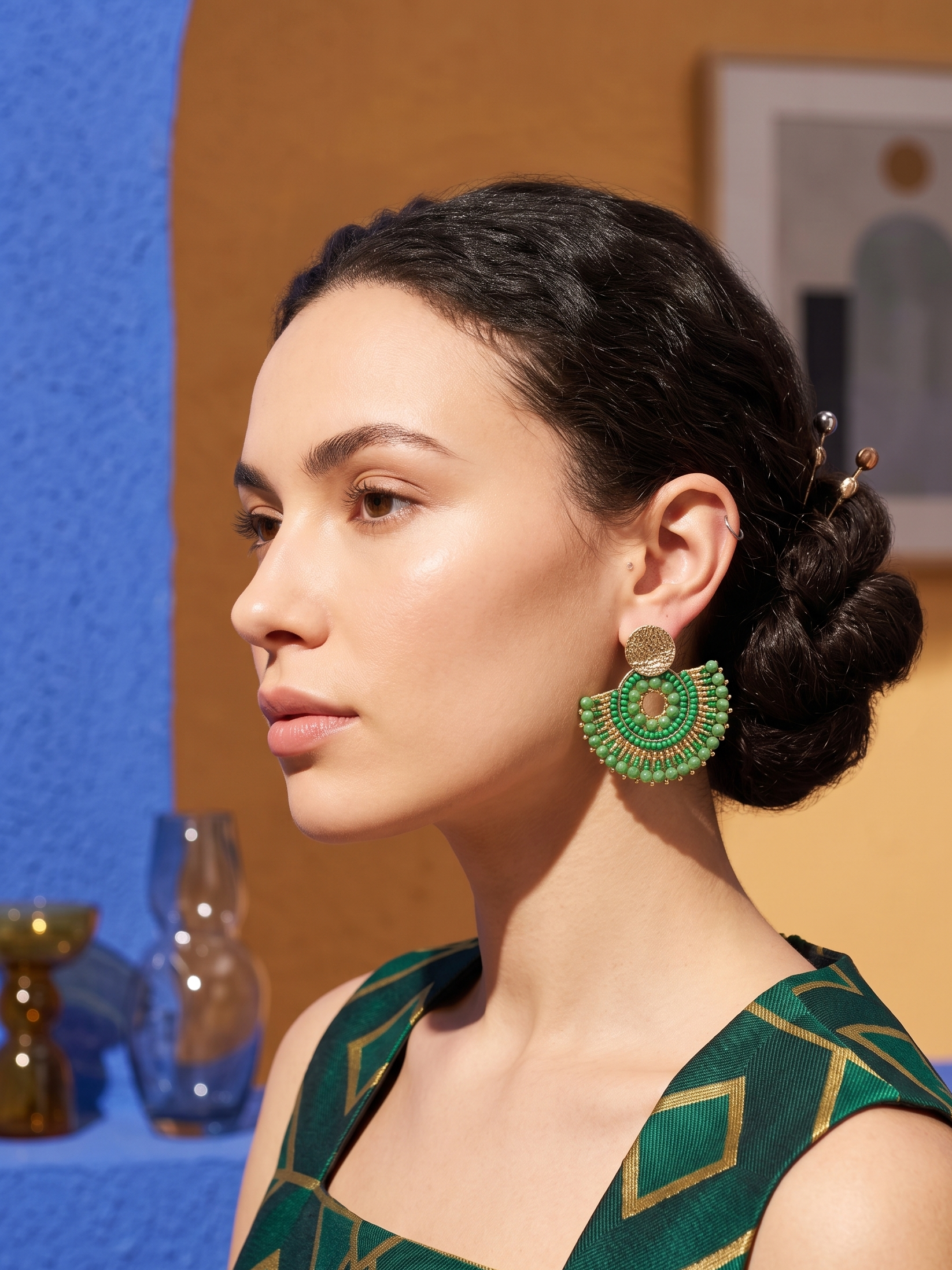 Big beaded earrings worn