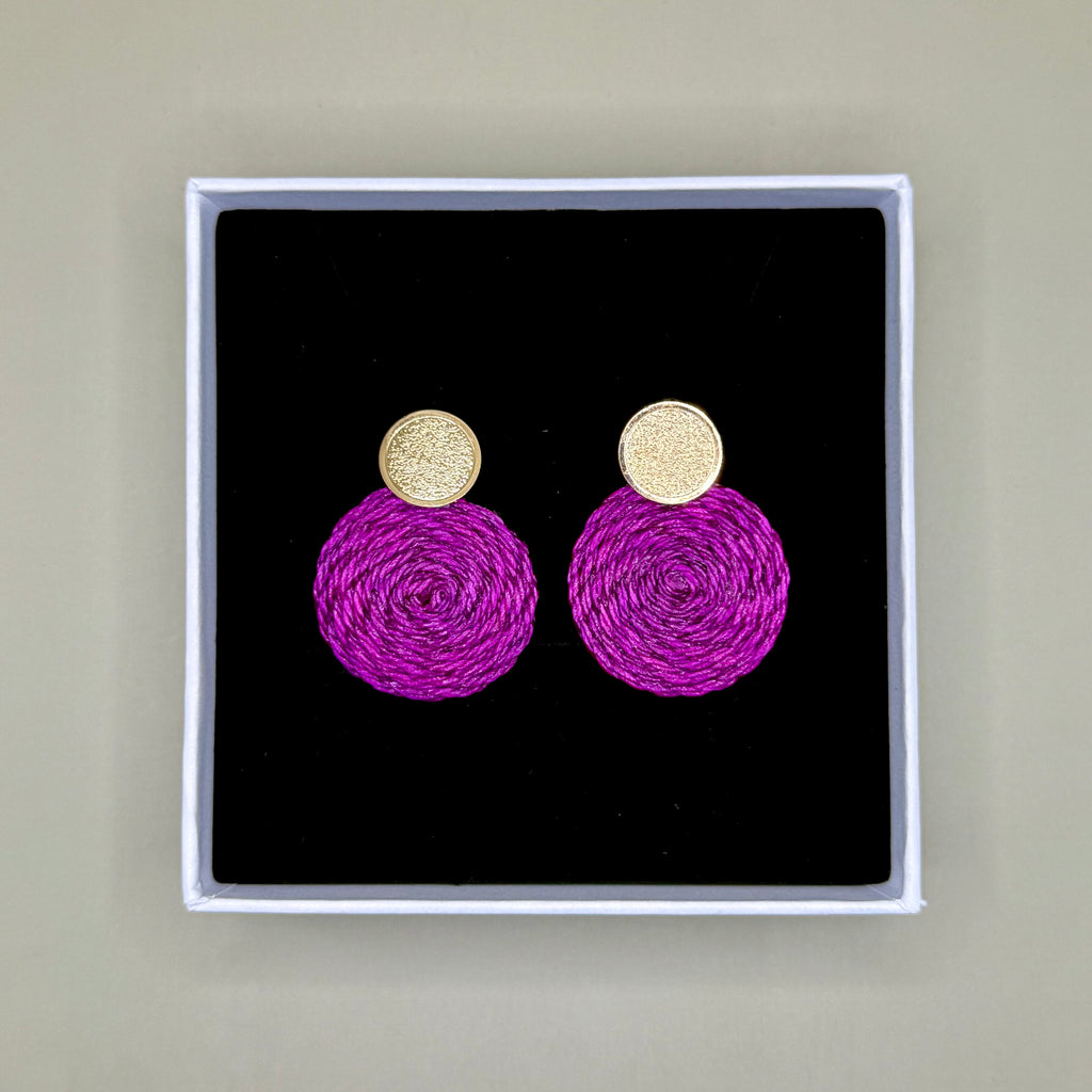 Magenta earrings in a box