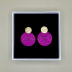 Magenta earrings in a box